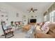 Open-concept living area filled with natural light and cozy furniture at 2605 Fulton Sw St, Largo, FL 33774