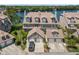 A peaceful aerial view of the townhouses with picturesque lake views at 2782 Countryside Blvd # 2, Clearwater, FL 33761