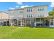 Large backyard with private enclosed patio and lake views at 2782 Countryside Blvd # 2, Clearwater, FL 33761