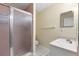 Bathroom featuring a glass door shower and sink with a clean, functional layout at 2782 Countryside Blvd # 2, Clearwater, FL 33761
