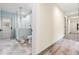 Bathroom featuring frameless glass shower, light blue walls, and ceramic tiled floors at 28628 Bennington Dr, Wesley Chapel, FL 33544