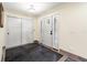 Bright foyer with decorative front door, closet, and modern tile flooring create an inviting space at 28628 Bennington Dr, Wesley Chapel, FL 33544