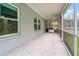 Spacious screened-in patio with lots of space to relax or entertain friends and Gathering at 28628 Bennington Dr, Wesley Chapel, FL 33544