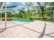 Relaxing screened pool with brick patio and refreshing water is ready for you to enjoy at 28628 Bennington Dr, Wesley Chapel, FL 33544
