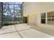 Large screened patio with open view to the yard at 3022 Forest Club Dr, Plant City, FL 33566