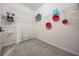 Walk-in closet features carpet flooring and a customizable shelving system at 31649 Tansy Bnd, Wesley Chapel, FL 33545