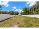Large backyard with a long fence and ample space for outdoor activities at 3310 70Th N Ave, St Petersburg, FL 33702