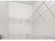Walk-in closet provides ample storage with its wire shelving system at 617 Scotland St, Dunedin, FL 34698