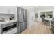 Modern kitchen with stainless steel appliances, sleek cabinetry, and bright lighting at 617 Scotland St, Dunedin, FL 34698