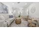 Cozy living room with neutral colors, comfortable seating, and stylish decor at 617 Scotland St, Dunedin, FL 34698
