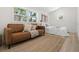 Living room with a sofa and bed in a well-lit space at 617 Scotland St, Dunedin, FL 34698