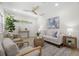 Inviting living room with hardwood floors, comfortable seating, and lots of light at 617 Scotland St, Dunedin, FL 34698