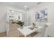 Bright office with a minimalist style, and view to adjacent rooms at 617 Scotland St, Dunedin, FL 34698