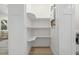 Pantry with adjustable shelving, providing ample storage at 617 Scotland St, Dunedin, FL 34698