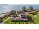 A lush golf course and several residential units surround a pristine ocean view with a sandy beach at 6269 Palma Del Mar S Blvd # 112, St Petersburg, FL 33715
