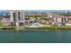 An aerial view of the complex shows manicured lawns, a pool, and several residential units at 6269 Palma Del Mar S Blvd # 112, St Petersburg, FL 33715