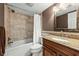 Bathroom featuring tile and granite countertops at 6269 Palma Del Mar S Blvd # 112, St Petersburg, FL 33715