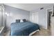 Bedroom with a large bed and neutral decor at 6269 Palma Del Mar S Blvd # 112, St Petersburg, FL 33715