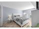 Comfortable bedroom with tiled floors, natural light, and serene ambiance at 6269 Palma Del Mar S Blvd # 112, St Petersburg, FL 33715
