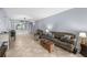 Comfortable living room featuring an open layout with tile flooring, creating a bright and airy atmosphere for everyday living at 6269 Palma Del Mar S Blvd # 112, St Petersburg, FL 33715