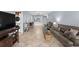 Spacious living room with an open layout, seamlessly connecting the living area to the kitchen and dining spaces at 6269 Palma Del Mar S Blvd # 112, St Petersburg, FL 33715