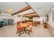 Meeting room featuring tables and chairs and wooden beams for decor at 650 Pinellas Point S Dr # 216, St Petersburg, FL 33705