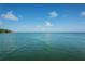 Tranquil water view showcasing calm, deep blue sea under a bright sky, ideal for a peaceful and serene escape at 650 Pinellas Point S Dr # 216, St Petersburg, FL 33705