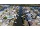 Aerial view of the waterfront community with access to waterways, docks, and diverse home styles at 6505 Bimini Ct, Apollo Beach, FL 33572