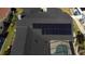 Overhead view of the home's roof with solar panels and the screened-in pool enclosure at 6505 Bimini Ct, Apollo Beach, FL 33572