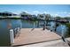 This dock offers a convenient private boat lift and easy access to the water for boating and recreation at 6505 Bimini Ct, Apollo Beach, FL 33572