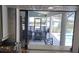 View of covered patio featuring outdoor dining from the kitchen window at 6505 Bimini Ct, Apollo Beach, FL 33572