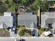 Aerial view of the home, showing the roof and surrounding greenery at 7014 Westcott Dr, Port Richey, FL 34668