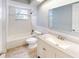 Updated bathroom showcasing a tub and shower combo and vanity with modern fixtures at 7014 Westcott Dr, Port Richey, FL 34668