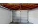 A closed, silver-colored garage door at 7014 Westcott Dr, Port Richey, FL 34668