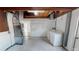 Unfinished laundry room with washer and dryer hookups and utility sink at 7014 Westcott Dr, Port Richey, FL 34668