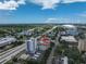 Bright aerial shot of a condo in a city featuring blue skies and a nearby domed stadium at 750 4Th Avenue South # 601H, St Petersburg, FL 33701