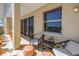Relax on this charming balcony featuring outdoor seating and patterned tile flooring at 750 4Th Avenue South # 601H, St Petersburg, FL 33701