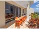 Inviting balcony with dining set, sliding glass doors, and views of city at 750 4Th Avenue South # 601H, St Petersburg, FL 33701