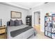 Well-lit bedroom features hardwood floors and an adjacent sitting area at 750 4Th Avenue South # 601H, St Petersburg, FL 33701