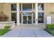 The Orion building entrance featuring glass doors, columns, and landscaping at 750 4Th Avenue South # 601H, St Petersburg, FL 33701