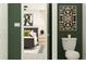 View into bedroom and bathroom with a toilet and green accent wall at 7770 Painted Sky Pl, Land O Lakes, FL 34637