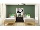 Shared bedroom featuring two beds with neutral decor and a classic black nightstand at 7770 Painted Sky Pl, Land O Lakes, FL 34637