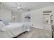 Comfortable main bedroom with carpet and calming neutral wall color at 7906 Bayshore Dr, Seminole, FL 33776