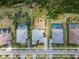 Beautiful aerial view of homes in an upscale neighborhood with lush landscaping and private pools at 814 Manns Harbor Dr, Apollo Beach, FL 33572