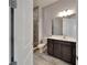 Bathroom showcasing a tiled shower, toilet, and vanity at 814 Manns Harbor Dr, Apollo Beach, FL 33572