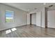 Bedroom with modern flooring and open closet at 814 Manns Harbor Dr, Apollo Beach, FL 33572