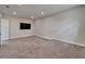 Versatile bonus room with neutral carpet and potential for various uses at 814 Manns Harbor Dr, Apollo Beach, FL 33572