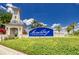 A beautifully landscaped entrance to the MiraBay community with a stately tower and bright signage at 814 Manns Harbor Dr, Apollo Beach, FL 33572