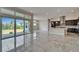 Open-concept kitchen with a large island and modern stainless steel appliances at 814 Manns Harbor Dr, Apollo Beach, FL 33572