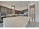 Bright kitchen featuring granite countertops, modern pendant lighting, and stainless appliances at 814 Manns Harbor Dr, Apollo Beach, FL 33572